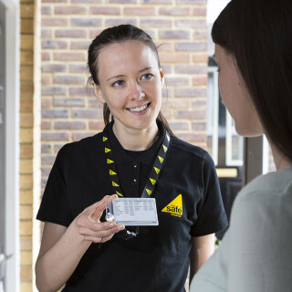 Engineer showing Gas Safe ID card